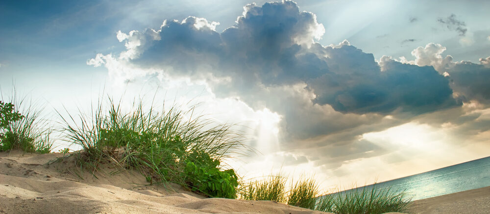 A beautiful sunset over Indiana Dunes State Park in July.