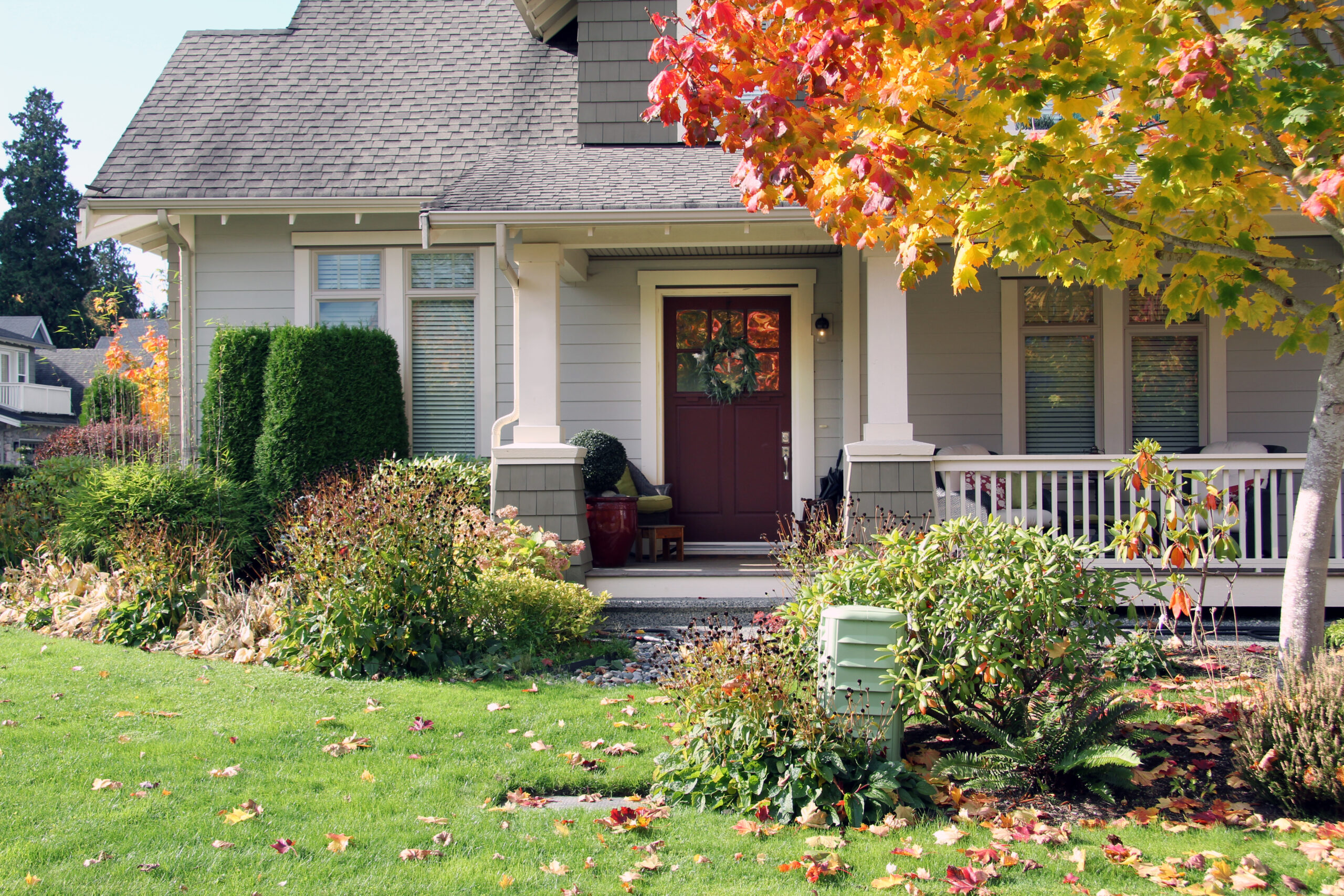 House with fall leaves